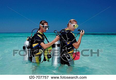 Diving Course, Instructor and Student, Maldives, Indian Ocean, Medhufushi, Meemu Atoll View Large Photo Image Stock Photo - Diving Course, Instructor and Student, Maldives, Indian Ocean, Medhufushi, Meemu Atoll. Fotosearch