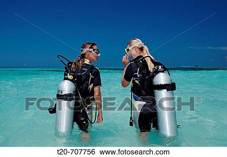 Diving Course, Instructor and Student, Maldives, Indian Ocean, Medhufushi, Meemu Atoll View Large Photo Image Stock Photograph - Diving Course, Instructor and Student, Maldives, Indian Ocean, Medhufushi, Meemu Atoll. Fotosearch