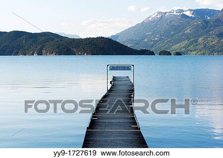 Stock Photo - Dock on Harrison Lake - Harrison Hot Springs, British Columbia, Canada. Fotosearch