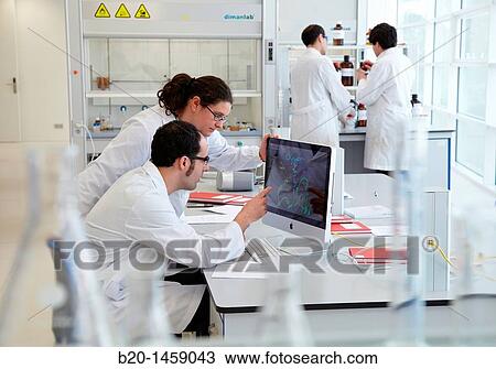 Stock Image - Docking, 3D computational model to simulate the molecular dynamics of proteins to develop new drugs, research lab, IkerChem research lab, design and synthesis of new chemical entities with therapeutic applications in oncology. Fotosearch