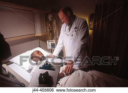 Doctor and nurse with black man patient in hospital room View Large Photo Image Stock Photograph - Doctor and nurse with black man patient in hospital room. Fotosearch