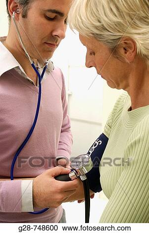 Doctor and patient View Large Photo Image Stock Image - Doctor and patient. Fotosearch