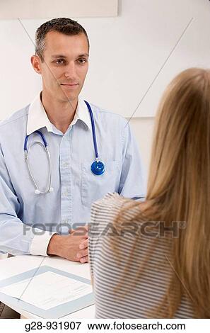 Doctor and patient View Large Photo Image Stock Photo - Doctor and patient. Fotosearch