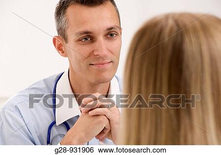 Doctor and patient View Large Photo Image Stock Photograph - Doctor and patient. Fotosearch