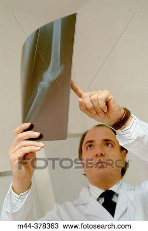Stock Image - Doctor and X-ray. Fotosearch