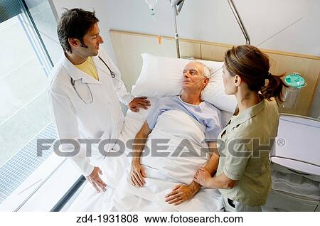 doctor attending to patient in hospital room, Onkologikoa Hospital, Oncology Institute, Case Center for prevention, diagnosis and treatment of cancer, Donostia, San Sebastian, Gipuzkoa, Basque Country, Spain View Large Photo Image Stock Photo - doctor attending to patient in hospital room, Onkologikoa Hospital, Oncology Institute, Case Center for prevention, diagnosis and treatment of cancer, Donostia, San Sebastian, Gipuzkoa, Basque Country, Spain. Fotosearch