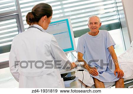 doctor attending to patient in hospital room, Onkologikoa Hospital, Oncology Institute, Case Center for prevention, diagnosis and treatment of cancer, Donostia, San Sebastian, Gipuzkoa, Basque Country, Spain View Large Photo Image Stock Photo - doctor attending to patient in hospital room, Onkologikoa Hospital, Oncology Institute, Case Center for prevention, diagnosis and treatment of cancer, Donostia, San Sebastian, Gipuzkoa, Basque Country, Spain. Fotosearch