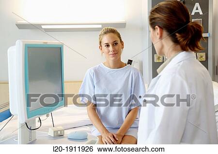doctor attending to patient in hospital room, Onkologikoa Hospital, Oncology Institute, Case Center for prevention, diagnosis and treatment of cancer, Donostia, San Sebastian, Gipuzkoa, Basque Country, Spain View Large Photo Image Stock Photograph - doctor attending to patient in hospital room, Onkologikoa Hospital, Oncology Institute, Case Center for prevention, diagnosis and treatment of cancer, Donostia, San Sebastian, Gipuzkoa, Basque Country, Spain. Fotosearch