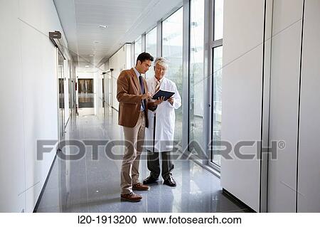 Doctor attending to seller, Corridor, Onkologikoa Hospital, Oncology Institute, Case Center for prevention, diagnosis and treatment of cancer, Donostia, San Sebastian, Gipuzkoa, Basque Country, Spain View Large Photo Image Stock Image - Doctor attending to seller, Corridor, Onkologikoa Hospital, Oncology Institute, Case Center for prevention, diagnosis and treatment of cancer, Donostia, San Sebastian, Gipuzkoa, Basque Country, Spain. Fotosearch