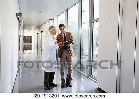 Doctor attending to seller, Corridor, Onkologikoa Hospital, Oncology Institute, Case Center for prevention, diagnosis and treatment of cancer, Donostia, San Sebastian, Gipuzkoa, Basque Country, Spain View Large Photo Image Stock Image - Doctor attending to seller, Corridor, Onkologikoa Hospital, Oncology Institute, Case Center for prevention, diagnosis and treatment of cancer, Donostia, San Sebastian, Gipuzkoa, Basque Country, Spain. Fotosearch