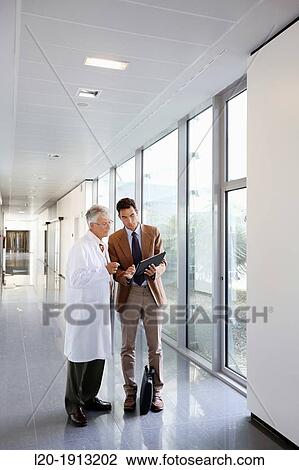 Doctor attending to seller, Corridor, Onkologikoa Hospital, Oncology Institute, Case Center for prevention, diagnosis and treatment of cancer, Donostia, San Sebastian, Gipuzkoa, Basque Country, Spain View Large Photo Image Stock Image - Doctor attending to seller, Corridor, Onkologikoa Hospital, Oncology Institute, Case Center for prevention, diagnosis and treatment of cancer, Donostia, San Sebastian, Gipuzkoa, Basque Country, Spain. Fotosearch