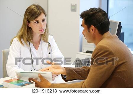 Doctor attending to seller, Tablet, Consulting room, Onkologikoa Hospital, Oncology Institute, Case Center for prevention, diagnosis and treatment of cancer, Donostia, San Sebastian, Gipuzkoa, Basque Country, Spain View Large Photo Image Stock Image - Doctor attending to seller, Tablet, Consulting room, Onkologikoa Hospital, Oncology Institute, Case Center for prevention, diagnosis and treatment of cancer, Donostia, San Sebastian, Gipuzkoa, Basque Country, Spain. Fotosearch