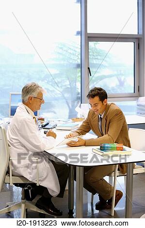 Doctor attending to seller, Tablet, Consulting room, Onkologikoa Hospital, Oncology Institute, Case Center for prevention, diagnosis and treatment of cancer, Donostia, San Sebastian, Gipuzkoa, Basque Country, Spain View Large Photo Image Stock Image - Doctor attending to seller, Tablet, Consulting room, Onkologikoa Hospital, Oncology Institute, Case Center for prevention, diagnosis and treatment of cancer, Donostia, San Sebastian, Gipuzkoa, Basque Country, Spain. Fotosearch