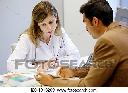 Doctor attending to seller, Tablet, Consulting room, Onkologikoa Hospital, Oncology Institute, Case Center for prevention, diagnosis and treatment of cancer, Donostia, San Sebastian, Gipuzkoa, Basque Country, Spain View Large Photo Image Stock Photo - Doctor attending to seller, Tablet, Consulting room, Onkologikoa Hospital, Oncology Institute, Case Center for prevention, diagnosis and treatment of cancer, Donostia, San Sebastian, Gipuzkoa, Basque Country, Spain. Fotosearch
