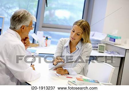 Doctor attending to seller, Tablet, Consulting room, Onkologikoa Hospital, Oncology Institute, Case Center for prevention, diagnosis and treatment of cancer, Donostia, San Sebastian, Gipuzkoa, Basque Country, Spain View Large Photo Image Stock Photo - Doctor attending to seller, Tablet, Consulting room, Onkologikoa Hospital, Oncology Institute, Case Center for prevention, diagnosis and treatment of cancer, Donostia, San Sebastian, Gipuzkoa, Basque Country, Spain. Fotosearch