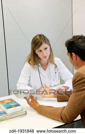 Doctor attending to seller, Tablet, Consulting room, Onkologikoa Hospital, Oncology Institute, Case Center for prevention, diagnosis and treatment of cancer, Donostia, San Sebastian, Gipuzkoa, Basque Country, Spain View Large Photo Image Stock Photo - Doctor attending to seller, Tablet, Consulting room, Onkologikoa Hospital, Oncology Institute, Case Center for prevention, diagnosis and treatment of cancer, Donostia, San Sebastian, Gipuzkoa, Basque Country, Spain. Fotosearch