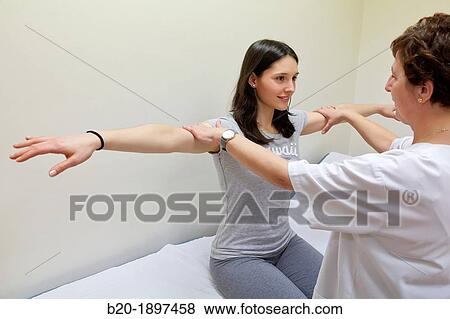 Doctor checking arm abduction strength, Physiotherapy medical center, Donostia, San Sebastian, Gipuzkoa, Basque Country, Spain View Large Photo Image Stock Photo - Doctor checking arm abduction strength, Physiotherapy medical center, Donostia, San Sebastian, Gipuzkoa, Basque Country, Spain. Fotosearch