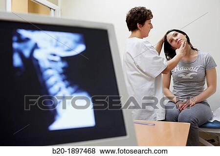 Doctor checking neck tilt, Cervical X-ray image, Physiotherapy medical center, Donostia, San Sebastian, Gipuzkoa, Basque Country, Spain View Large Photo Image Stock Photo - Doctor checking neck tilt, Cervical X-ray image, Physiotherapy medical center, Donostia, San Sebastian, Gipuzkoa, Basque Country, Spain. Fotosearch