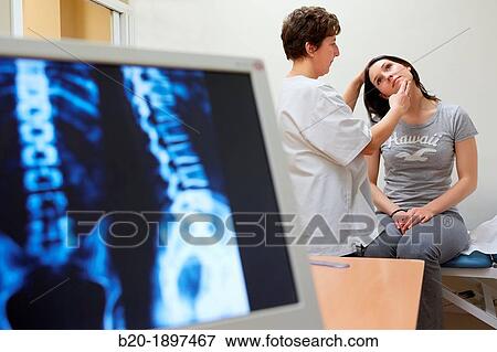 Doctor checking neck tilt, Column X-ray image, Physiotherapy medical center, Donostia, San Sebastian, Gipuzkoa, Basque Country, Spain View Large Photo Image Stock Photo - Doctor checking neck tilt, Column X-ray image, Physiotherapy medical center, Donostia, San Sebastian, Gipuzkoa, Basque Country, Spain. Fotosearch
