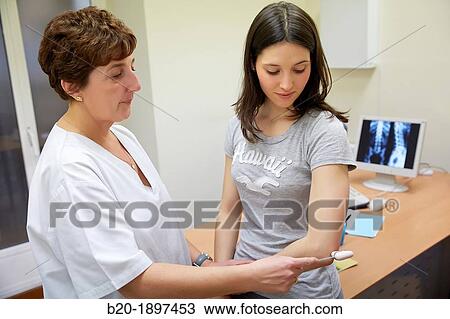 Doctor checking triceps reflex, Physiotherapy medical center, Donostia, San Sebastian, Gipuzkoa, Basque Country, Spain View Large Photo Image Stock Image - Doctor checking triceps reflex, Physiotherapy medical center, Donostia, San Sebastian, Gipuzkoa, Basque Country, Spain. Fotosearch