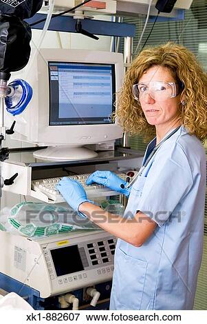 Doctor entering data View Large Photo Image Stock Photo - Doctor entering data. Fotosearch