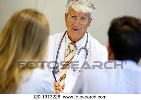 Doctor, family, Consulting room, Onkologikoa Hospital, Oncology Institute, Case Center for prevention, diagnosis and treatment of cancer, Donostia, San Sebastian, Gipuzkoa, Basque Country, Spain View Large Photo Image Stock Photo - Doctor, family, Consulting room, Onkologikoa Hospital, Oncology Institute, Case Center for prevention, diagnosis and treatment of cancer, Donostia, San Sebastian, Gipuzkoa, Basque Country, Spain. Fotosearch