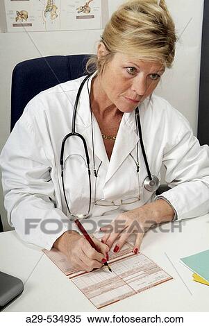 Doctor in her office View Large Photo Image Stock Photography - Doctor in her office. Fotosearch
