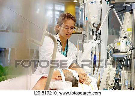 Stock Image - Doctor, Resuscitation unit. Hospital Universitario de Gran Canaria Doctor Negrin, Las Palmas de Gran Canaria. Canary Islands, Spain. Fotosearch