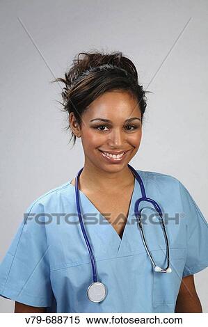 Doctor smiling with stethoscope View Large Photo Image Stock Photography - Doctor smiling with stethoscope. Fotosearch