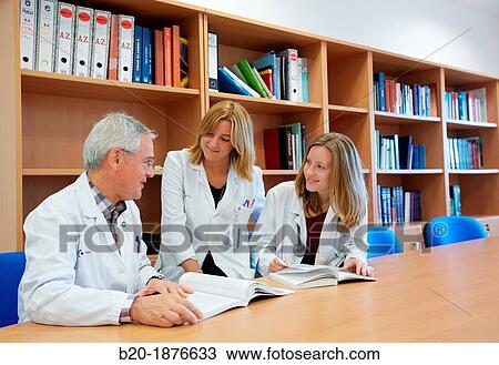 Doctor teaching medical students in library, Doctors in meeting room, Hospital Donostia, San Sebastian, Gipuzkoa, Basque Country, Spain View Large Photo Image Stock Image - Doctor teaching medical students in library, Doctors in meeting room, Hospital Donostia, San Sebastian, Gipuzkoa, Basque Country, Spain. Fotosearch
