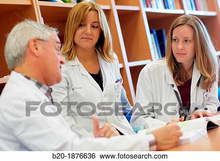 Doctor teaching medical students in library, Doctors in meeting room, Hospital Donostia, San Sebastian, Gipuzkoa, Basque Country, Spain View Large Photo Image Stock Photograph - Doctor teaching medical students in library, Doctors in meeting room, Hospital Donostia, San Sebastian, Gipuzkoa, Basque Country, Spain. Fotosearch