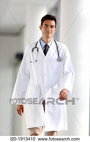 Doctor walking in corridor, Onkologikoa Hospital, Oncology Institute, Case Center for prevention, diagnosis and treatment of cancer, Donostia, San Sebastian, Gipuzkoa, Basque Country, Spain View Large Photo Image Stock Image - Doctor walking in corridor, Onkologikoa Hospital, Oncology Institute, Case Center for prevention, diagnosis and treatment of cancer, Donostia, San Sebastian, Gipuzkoa, Basque Country, Spain. Fotosearch