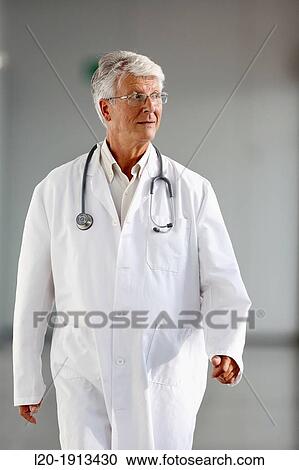 Doctor walking in corridor, Onkologikoa Hospital, Oncology Institute, Case Center for prevention, diagnosis and treatment of cancer, Donostia, San Sebastian, Gipuzkoa, Basque Country, Spain View Large Photo Image Stock Image - Doctor walking in corridor, Onkologikoa Hospital, Oncology Institute, Case Center for prevention, diagnosis and treatment of cancer, Donostia, San Sebastian, Gipuzkoa, Basque Country, Spain. Fotosearch