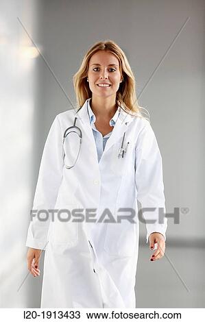 Doctor walking in corridor, Onkologikoa Hospital, Oncology Institute, Case Center for prevention, diagnosis and treatment of cancer, Donostia, San Sebastian, Gipuzkoa, Basque Country, Spain View Large Photo Image Stock Image - Doctor walking in corridor, Onkologikoa Hospital, Oncology Institute, Case Center for prevention, diagnosis and treatment of cancer, Donostia, San Sebastian, Gipuzkoa, Basque Country, Spain. Fotosearch