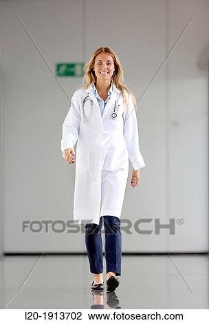 Doctor walking in corridor, Onkologikoa Hospital, Oncology Institute, Case Center for prevention, diagnosis and treatment of cancer, Donostia, San Sebastian, Gipuzkoa, Basque Country, Spain View Large Photo Image Stock Image - Doctor walking in corridor, Onkologikoa Hospital, Oncology Institute, Case Center for prevention, diagnosis and treatment of cancer, Donostia, San Sebastian, Gipuzkoa, Basque Country, Spain. Fotosearch