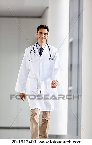 Doctor walking in corridor, Onkologikoa Hospital, Oncology Institute, Case Center for prevention, diagnosis and treatment of cancer, Donostia, San Sebastian, Gipuzkoa, Basque Country, Spain View Large Photo Image Stock Photo - Doctor walking in corridor, Onkologikoa Hospital, Oncology Institute, Case Center for prevention, diagnosis and treatment of cancer, Donostia, San Sebastian, Gipuzkoa, Basque Country, Spain. Fotosearch
