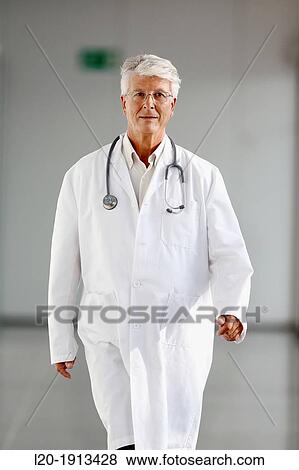 Doctor walking in corridor, Onkologikoa Hospital, Oncology Institute, Case Center for prevention, diagnosis and treatment of cancer, Donostia, San Sebastian, Gipuzkoa, Basque Country, Spain View Large Photo Image Stock Photo - Doctor walking in corridor, Onkologikoa Hospital, Oncology Institute, Case Center for prevention, diagnosis and treatment of cancer, Donostia, San Sebastian, Gipuzkoa, Basque Country, Spain. Fotosearch