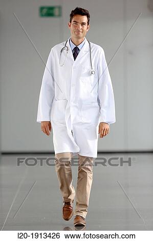 Doctor walking in corridor, Onkologikoa Hospital, Oncology Institute, Case Center for prevention, diagnosis and treatment of cancer, Donostia, San Sebastian, Gipuzkoa, Basque Country, Spain View Large Photo Image Stock Photograph - Doctor walking in corridor, Onkologikoa Hospital, Oncology Institute, Case Center for prevention, diagnosis and treatment of cancer, Donostia, San Sebastian, Gipuzkoa, Basque Country, Spain. Fotosearch