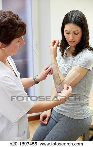 Doctor with goniometer measuring elbow flexion, Physiotherapy medical center, Donostia, San Sebastian, Gipuzkoa, Basque Country, Spain View Large Photo Image Stock Photography - Doctor with goniometer measuring elbow flexion, Physiotherapy medical center, Donostia, San Sebastian, Gipuzkoa, Basque Country, Spain. Fotosearch