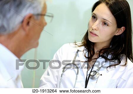 Doctor with patient, Consulting room, Onkologikoa Hospital, Oncology Institute, Case Center for prevention, diagnosis and treatment of cancer, Donostia, San Sebastian, Gipuzkoa, Basque Country, Spain View Large Photo Image Picture - Doctor with patient, Consulting room, Onkologikoa Hospital, Oncology Institute, Case Center for prevention, diagnosis and treatment of cancer, Donostia, San Sebastian, Gipuzkoa, Basque Country, Spain. Fotosearch