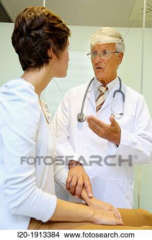 Doctor with patient, Consulting room, Onkologikoa Hospital, Oncology Institute, Case Center for prevention, diagnosis and treatment of cancer, Donostia, San Sebastian, Gipuzkoa, Basque Country, Spain View Large Photo Image Picture - Doctor with patient, Consulting room, Onkologikoa Hospital, Oncology Institute, Case Center for prevention, diagnosis and treatment of cancer, Donostia, San Sebastian, Gipuzkoa, Basque Country, Spain. Fotosearch