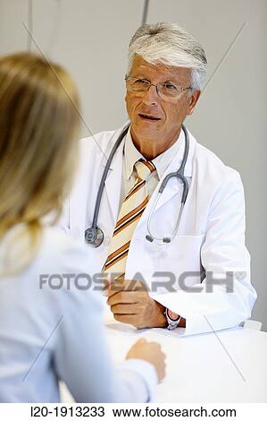 Doctor with patient, Consulting room, Onkologikoa Hospital, Oncology Institute, Case Center for prevention, diagnosis and treatment of cancer, Donostia, San Sebastian, Gipuzkoa, Basque Country, Spain View Large Photo Image Stock Image - Doctor with patient, Consulting room, Onkologikoa Hospital, Oncology Institute, Case Center for prevention, diagnosis and treatment of cancer, Donostia, San Sebastian, Gipuzkoa, Basque Country, Spain. Fotosearch