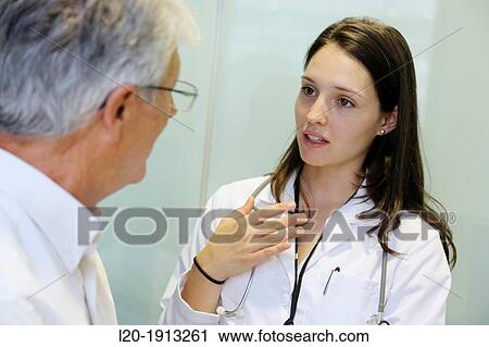 Doctor with patient, Consulting room, Onkologikoa Hospital, Oncology Institute, Case Center for prevention, diagnosis and treatment of cancer, Donostia, San Sebastian, Gipuzkoa, Basque Country, Spain View Large Photo Image Stock Image - Doctor with patient, Consulting room, Onkologikoa Hospital, Oncology Institute, Case Center for prevention, diagnosis and treatment of cancer, Donostia, San Sebastian, Gipuzkoa, Basque Country, Spain. Fotosearch