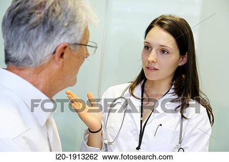 Doctor with patient, Consulting room, Onkologikoa Hospital, Oncology Institute, Case Center for prevention, diagnosis and treatment of cancer, Donostia, San Sebastian, Gipuzkoa, Basque Country, Spain View Large Photo Image Stock Image - Doctor with patient, Consulting room, Onkologikoa Hospital, Oncology Institute, Case Center for prevention, diagnosis and treatment of cancer, Donostia, San Sebastian, Gipuzkoa, Basque Country, Spain. Fotosearch