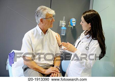 Doctor with patient, Consulting room, Onkologikoa Hospital, Oncology Institute, Case Center for prevention, diagnosis and treatment of cancer, Donostia, San Sebastian, Gipuzkoa, Basque Country, Spain View Large Photo Image Stock Image - Doctor with patient, Consulting room, Onkologikoa Hospital, Oncology Institute, Case Center for prevention, diagnosis and treatment of cancer, Donostia, San Sebastian, Gipuzkoa, Basque Country, Spain. Fotosearch