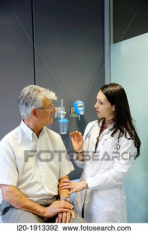 Doctor with patient, Consulting room, Onkologikoa Hospital, Oncology Institute, Case Center for prevention, diagnosis and treatment of cancer, Donostia, San Sebastian, Gipuzkoa, Basque Country, Spain View Large Photo Image Stock Image - Doctor with patient, Consulting room, Onkologikoa Hospital, Oncology Institute, Case Center for prevention, diagnosis and treatment of cancer, Donostia, San Sebastian, Gipuzkoa, Basque Country, Spain. Fotosearch