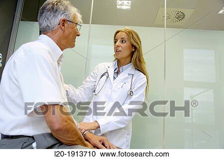 Doctor with patient, Consulting room, Onkologikoa Hospital, Oncology Institute, Case Center for prevention, diagnosis and treatment of cancer, Donostia, San Sebastian, Gipuzkoa, Basque Country, Spain View Large Photo Image Stock Image - Doctor with patient, Consulting room, Onkologikoa Hospital, Oncology Institute, Case Center for prevention, diagnosis and treatment of cancer, Donostia, San Sebastian, Gipuzkoa, Basque Country, Spain. Fotosearch