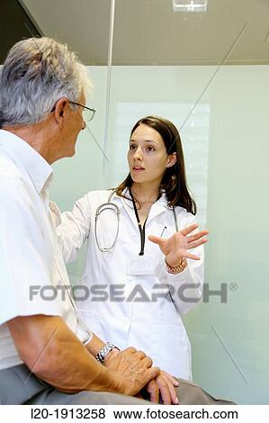 Doctor with patient, Consulting room, Onkologikoa Hospital, Oncology Institute, Case Center for prevention, diagnosis and treatment of cancer, Donostia, San Sebastian, Gipuzkoa, Basque Country, Spain View Large Photo Image Stock Photo - Doctor with patient, Consulting room, Onkologikoa Hospital, Oncology Institute, Case Center for prevention, diagnosis and treatment of cancer, Donostia, San Sebastian, Gipuzkoa, Basque Country, Spain. Fotosearch