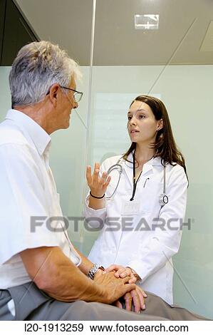 Doctor with patient, Consulting room, Onkologikoa Hospital, Oncology Institute, Case Center for prevention, diagnosis and treatment of cancer, Donostia, San Sebastian, Gipuzkoa, Basque Country, Spain View Large Photo Image Stock Photo - Doctor with patient, Consulting room, Onkologikoa Hospital, Oncology Institute, Case Center for prevention, diagnosis and treatment of cancer, Donostia, San Sebastian, Gipuzkoa, Basque Country, Spain. Fotosearch