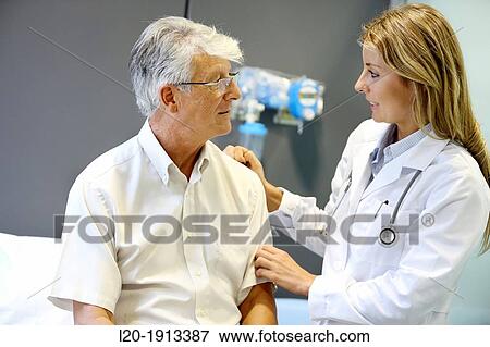 Doctor with patient, Consulting room, Onkologikoa Hospital, Oncology Institute, Case Center for prevention, diagnosis and treatment of cancer, Donostia, San Sebastian, Gipuzkoa, Basque Country, Spain View Large Photo Image Stock Photo - Doctor with patient, Consulting room, Onkologikoa Hospital, Oncology Institute, Case Center for prevention, diagnosis and treatment of cancer, Donostia, San Sebastian, Gipuzkoa, Basque Country, Spain. Fotosearch